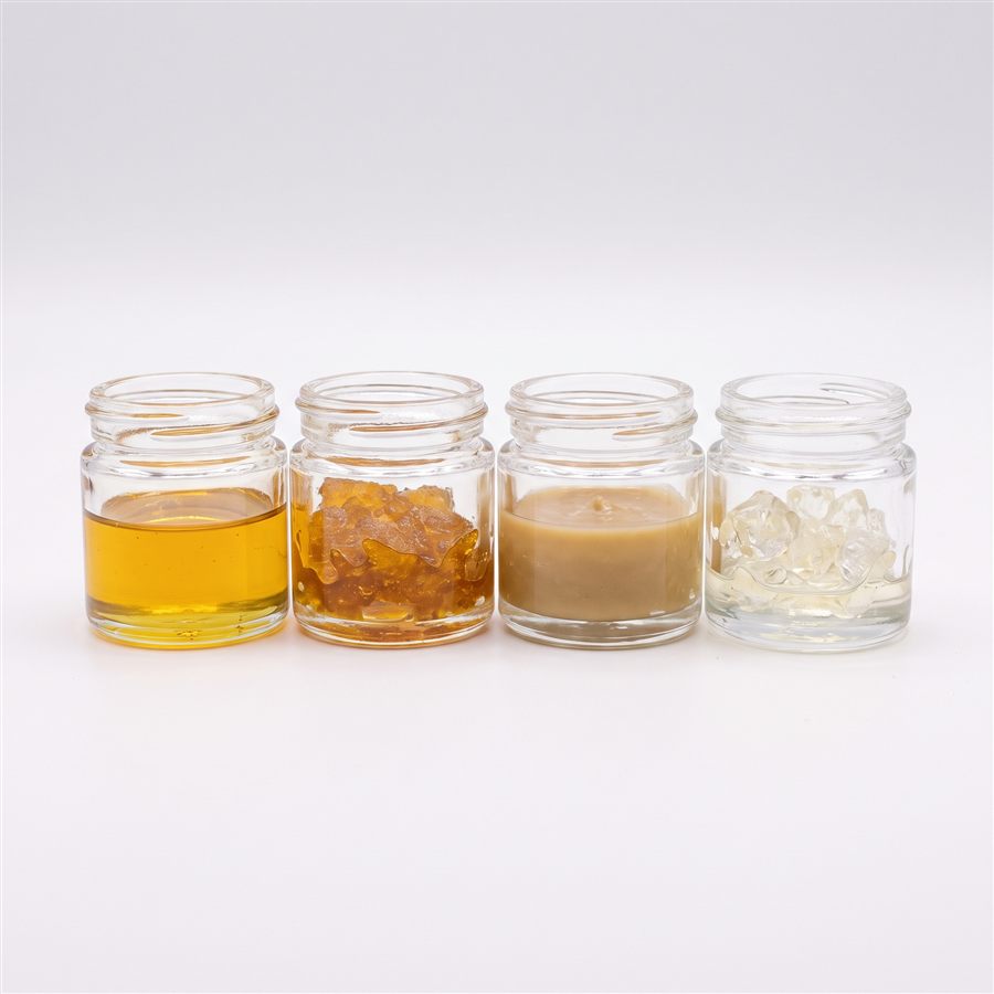 Four jars of distillate, resin, rosin, and liquid diamonds concentrate